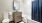 Bathroom with single vanity and white subway tile